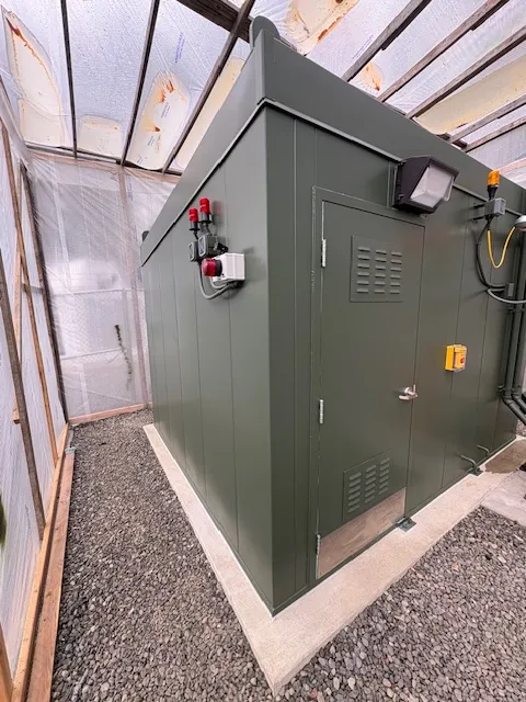 Custom drop-over enclosure protecting industrial equipment